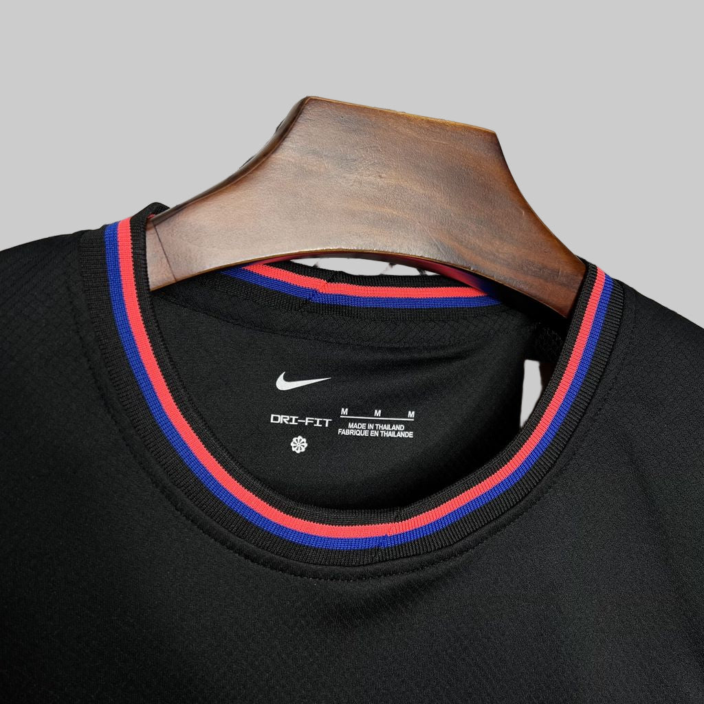 FC Barcelona pink and blue shirt 2024-25